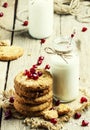 Drinking yogurt in bottles and cookies, selective focus Royalty Free Stock Photo