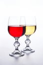 Two Glasses of red and white wine on light background Royalty Free Stock Photo