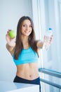 Drinks. Happy Girl Drinking Water. Healthcare. Healthy Lifestyle Royalty Free Stock Photo