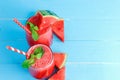 Drinks for the healthy of summer. Cold watermelon smoothie drinks top view, flat lay on blue wooden background Royalty Free Stock Photo