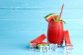 Drinks for the healthy of summer. Smoothie drinks cold watermelon on blue wooden background Royalty Free Stock Photo