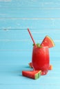 Drinks for the healthy of summer. Smoothie drinks cold watermelon on blue wooden background Royalty Free Stock Photo