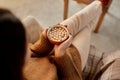 woman holding mug of hot chocolate and marshmallow Royalty Free Stock Photo