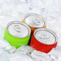 Drinks lemonade cola drink softdrinks in cans with ice cubes square Royalty Free Stock Photo