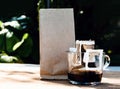 Drip coffee cup with bag coffee, paper dripping bag on a cup Royalty Free Stock Photo