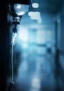 Drip in hospital on the background of dark empty corridor Royalty Free Stock Photo