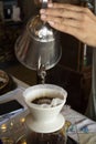 Driping coffee by poured hot water over roaset coffee bean Royalty Free Stock Photo