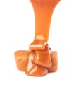 Dripped liquid caramel and candy Royalty Free Stock Photo