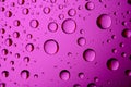 Dripped water on glass. Pink abstract background Royalty Free Stock Photo