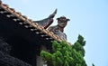 The dripping eaves tiles and clay sculpture of eaves