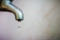 Dripping faucet. In water d'times of crisis it is important to s. Royalty Free Stock Photo