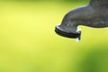 Dripping Faucet with Water Drop Royalty Free Stock Photo