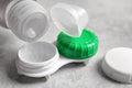 Dripping solution into contact lens case