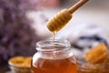 Dripping sweet fresh honey from wooden dipper