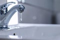 Dripping water tap at sink Royalty Free Stock Photo