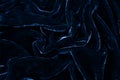 Drity blue fabric closeup. Velvet texture background. Classic blue color of year 2020.