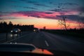 Drive car at beautiful sunset. Nature landscape Royalty Free Stock Photo