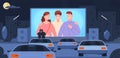 Drive cinema. Romantic couple sitting roof car watching movie big screen outdoor theater in night auto parking space Royalty Free Stock Photo