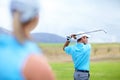 Drive, man or golfer playing golf for fitness, workout or exercise to swing or drive on green course. Woman blur, person Royalty Free Stock Photo