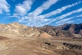 Drive rises up to the top of an alluvial fan fed by a deep canyon cut into the Black Mountains.