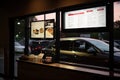drive-thru window with greeter and menu items visible, offering convenient and efficient service Royalty Free Stock Photo