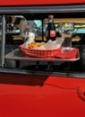 Drive through tray display on antique car at car show