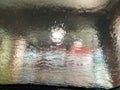 Drive view looking out through the windshield while going through an indoor automatic car wash Royalty Free Stock Photo