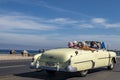 Drive in vintage car over MalecÃÂ³n, Havana, Cuba