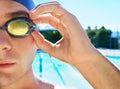 Driven to sporting excellence. Cropped portrait of a handsome male swimmer getting ready to compete. Royalty Free Stock Photo