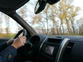 The driver attitude with hands on the steering wheel in car on high speed Royalty Free Stock Photo