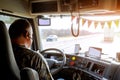 Driver in cabin of big modern truck Royalty Free Stock Photo