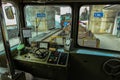 Driver cabin of narrow gauge train in Murren, connecting villages in Lauterbrunnen valley standing on a station. A lot of snow