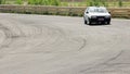 Driver cornering drifting on wild speed, striving for leadership