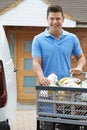 Driver Delivering Online Grocery Order To House