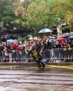 Driver doing stunt on the motorbike with crowd in the barckround Royalty Free Stock Photo