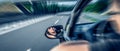 Driver drives a car. Motion blur. Royalty Free Stock Photo