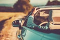 Driver Enjoying Summer Road Trip in His Cabriolet Convertible Car Royalty Free Stock Photo
