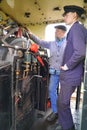 Driver and fireman in steam engine cab Royalty Free Stock Photo