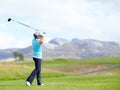 Driver, girl or golfer playing golf for fitness, workout or exercise with a swing on a green course. Wellness, woman Royalty Free Stock Photo