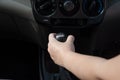 Driver hand shifting the gear stick,Hand on car gear knob.The driver switches the speed in car. Hand on gear lever Royalty Free Stock Photo