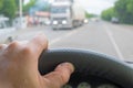 The driver hand on the steering wheel during the ride Royalty Free Stock Photo