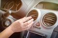 Driver hand tuning air ventilation grille Royalty Free Stock Photo