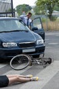 Driver hitting a female biker