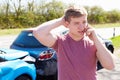 Driver Making Phone Call After Traffic Accident Royalty Free Stock Photo