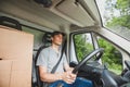 Driver man driving delivery truck car vehicle Royalty Free Stock Photo