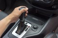 Driver man hand holding automatic transmission in car Royalty Free Stock Photo