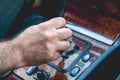 Driver man hand holding automatic transmission in car. Male hand changing levels of automatic gearbox in the car Royalty Free Stock Photo