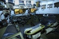Driver-mechanic cabin of Ukrainian combat reconnaissance vehicle BRDM 2 : seat, wheel, dashboard Royalty Free Stock Photo