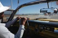 Driver of Old car in Havana, Cuba Royalty Free Stock Photo