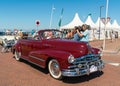 Driver of Oldtimer is being interviewed by a camera crew at the annual national oldtimer day in Lelystad